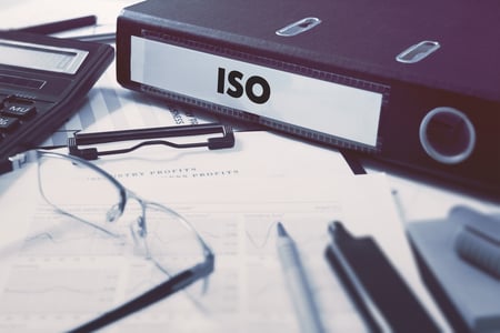 Office folder with inscription ISO - International Organization for Standardization - on Office Desktop with Office Supplies. Business Concept on Blurred Background. Toned Image. Office folder with inscription ISO - International Organization for Standardization - on Office Desktop with Office Supplies. Business Concept on Blurred Background. Toned Image.